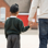 primary school aged Sikh boy holding the hand of an adult