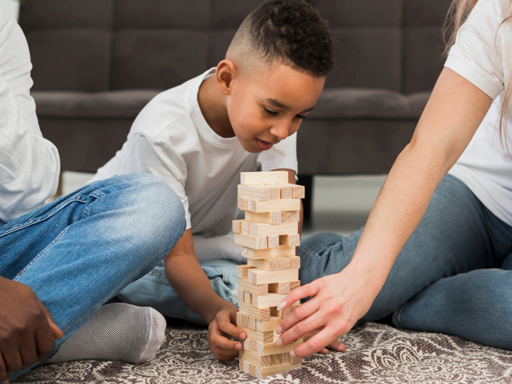 Child Playing Jenga